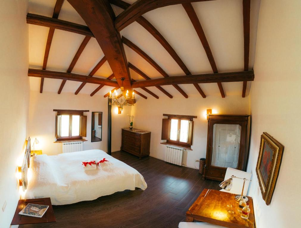 Postel nebo postele na pokoji v ubytování SommaVilla B&B