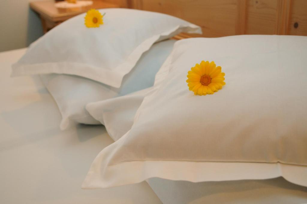 Postel nebo postele na pokoji v ubytování Hotel Kirchenwirt