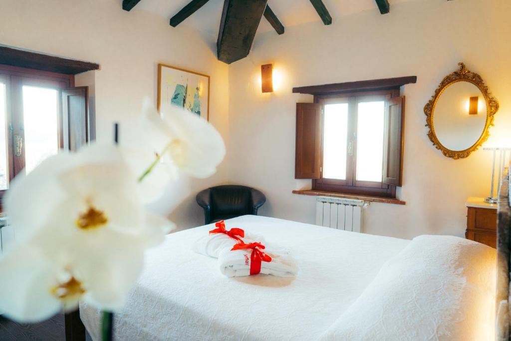 Postel nebo postele na pokoji v ubytování SommaVilla B&B