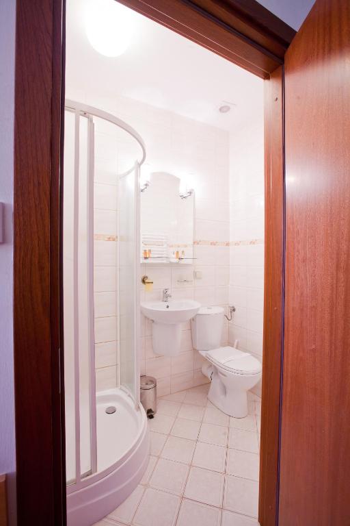 Koupelna v ubytování Hotel Trylogia