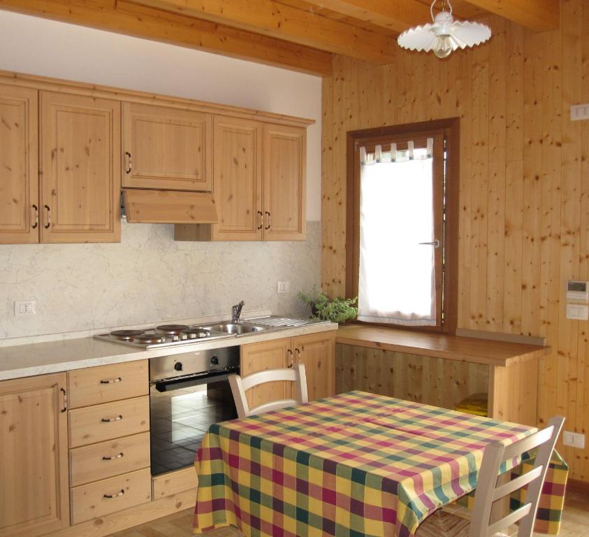 Kuchyň nebo kuchyňský kout v ubytování Agriturismo L'Acero Rosso
