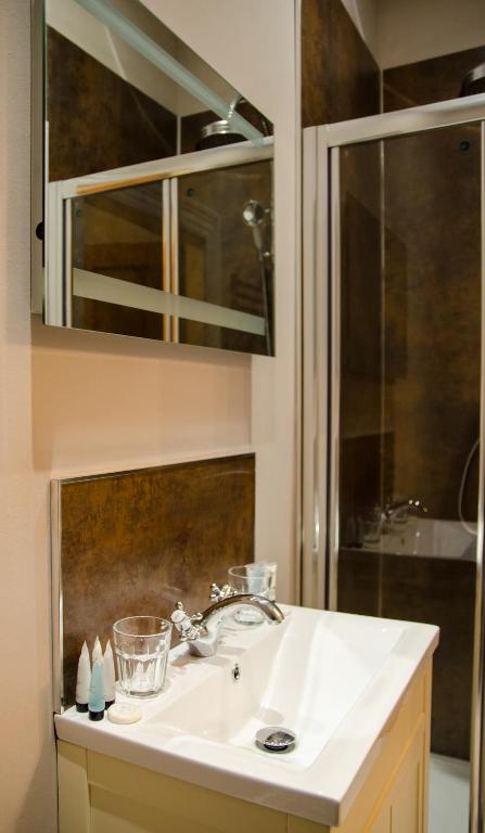 a bathroom with a sink and a shower at The Carrick in Portrush