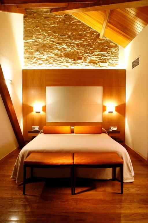 Postel nebo postele na pokoji v ubytování Hotel Altaïr