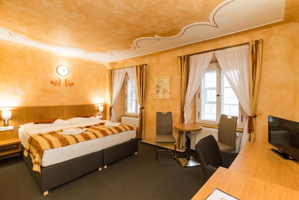 Łóżko lub łóżka w pokoju w obiekcie Pension Galko