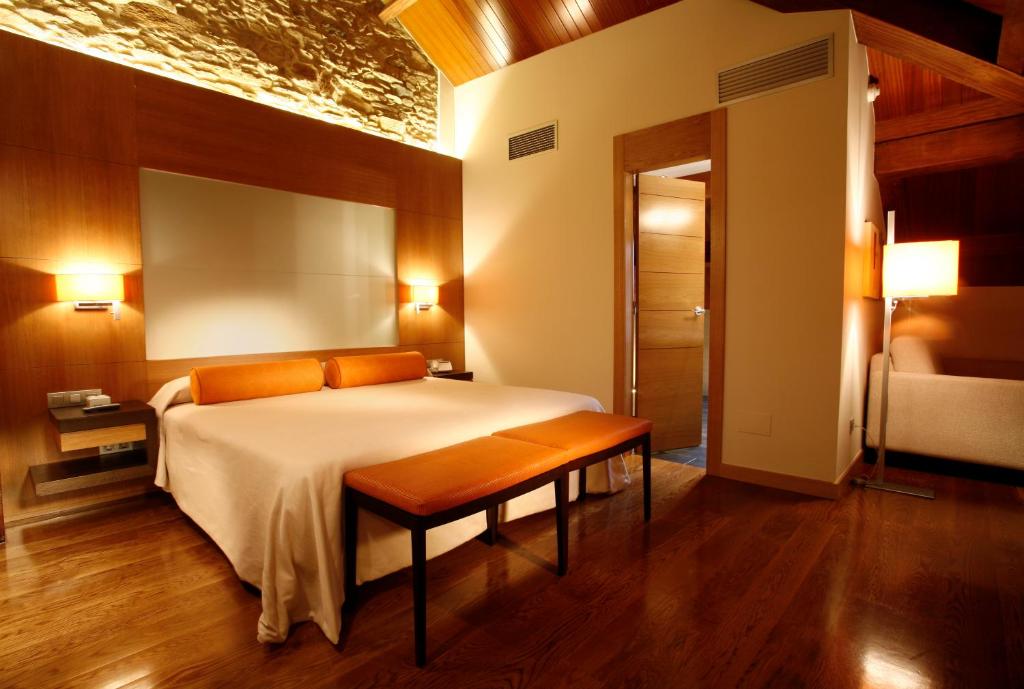 Postel nebo postele na pokoji v ubytování Hotel Altaïr