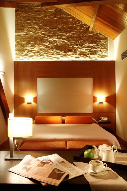 Postel nebo postele na pokoji v ubytování Hotel Altaïr