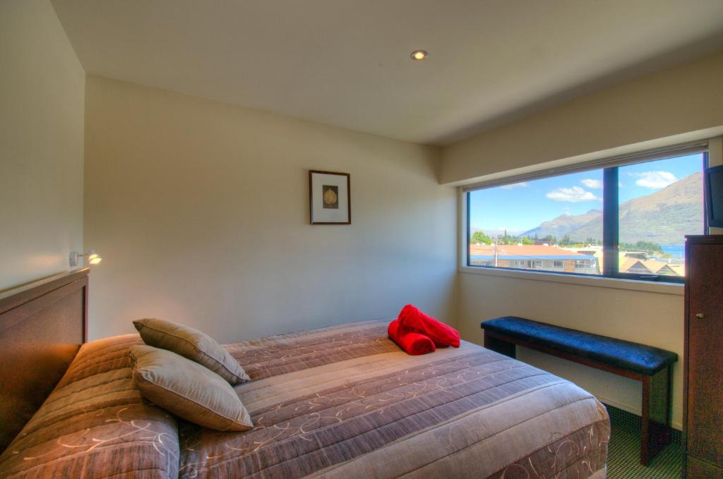 Postel nebo postele na pokoji v ubytování Four Seasons Motel