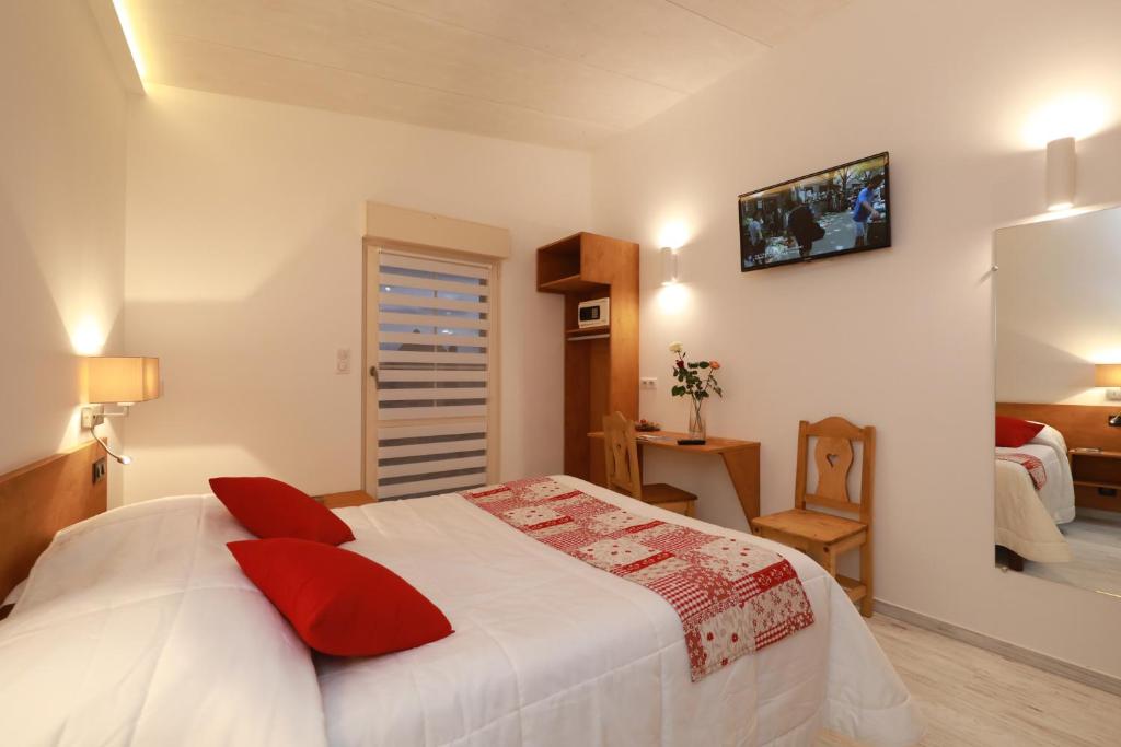 Postel nebo postele na pokoji v ubytování Hotel Restaurant 3 Châteaux