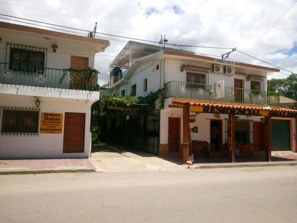 a group of buildings on the side of a street at Residencial Shalom in Cafayate