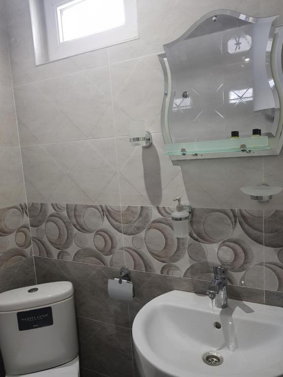 Koupelna v ubytování Guest House Khergiani