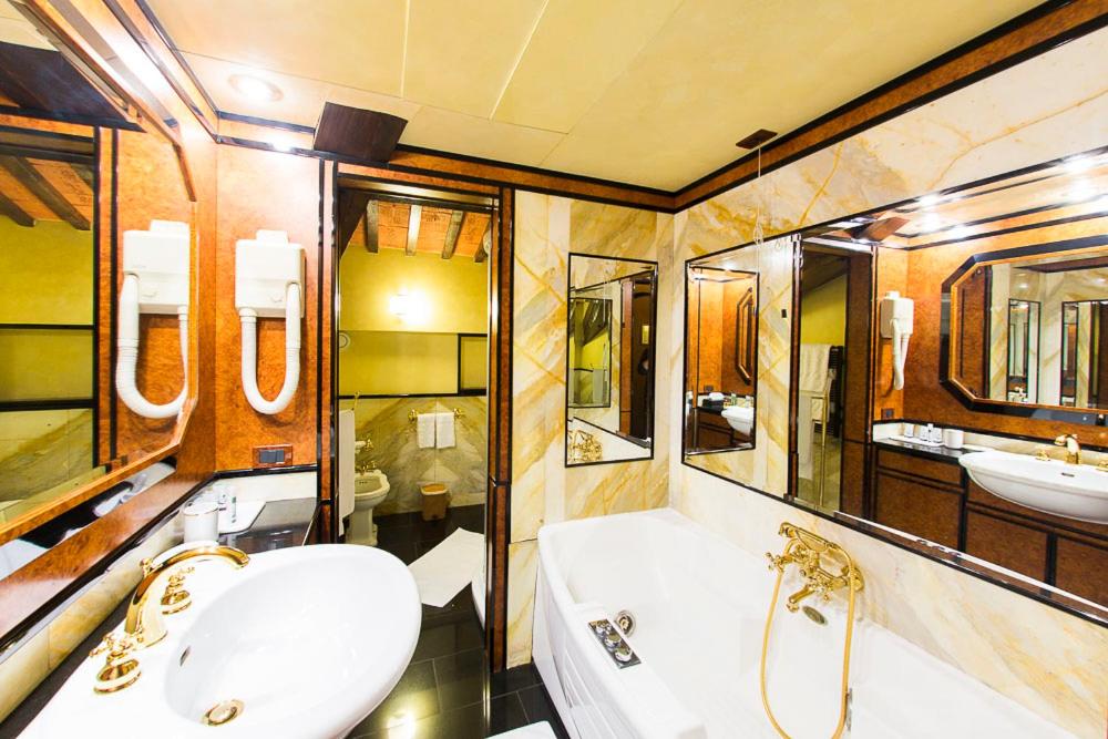 Kúpeľňa v ubytovaní Relais Villabella Hotel