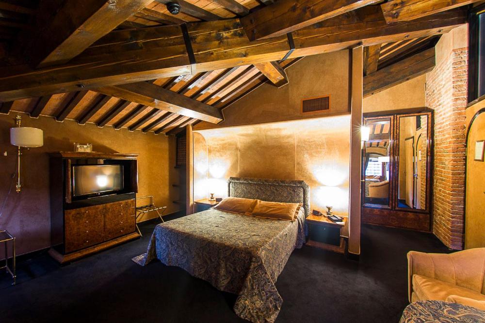 Posteľ alebo postele v izbe v ubytovaní Relais Villabella Hotel