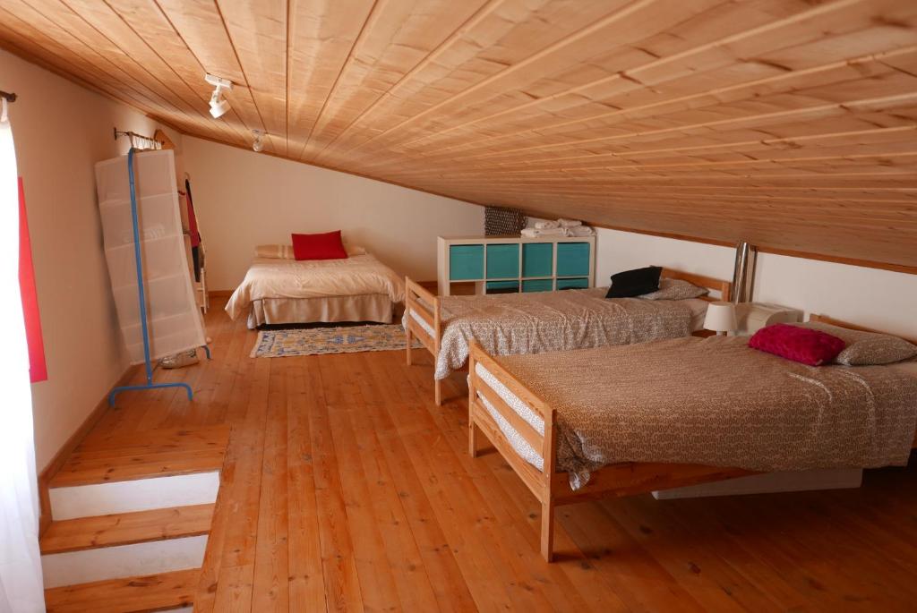 Tempat tidur dalam kamar di Casa Pedralva