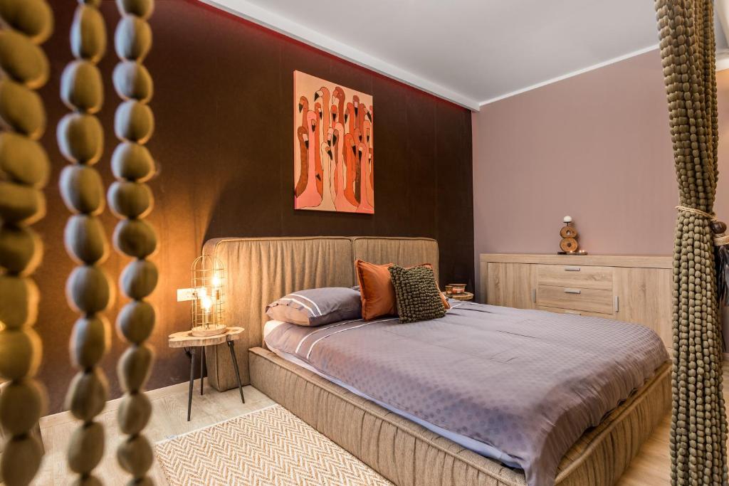 Posteľ alebo postele v izbe v ubytovaní Kappa apartments