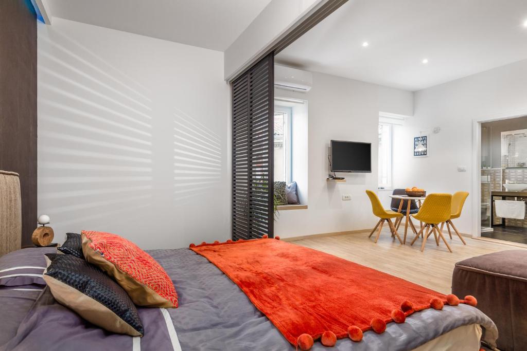 Posteľ alebo postele v izbe v ubytovaní Kappa apartments