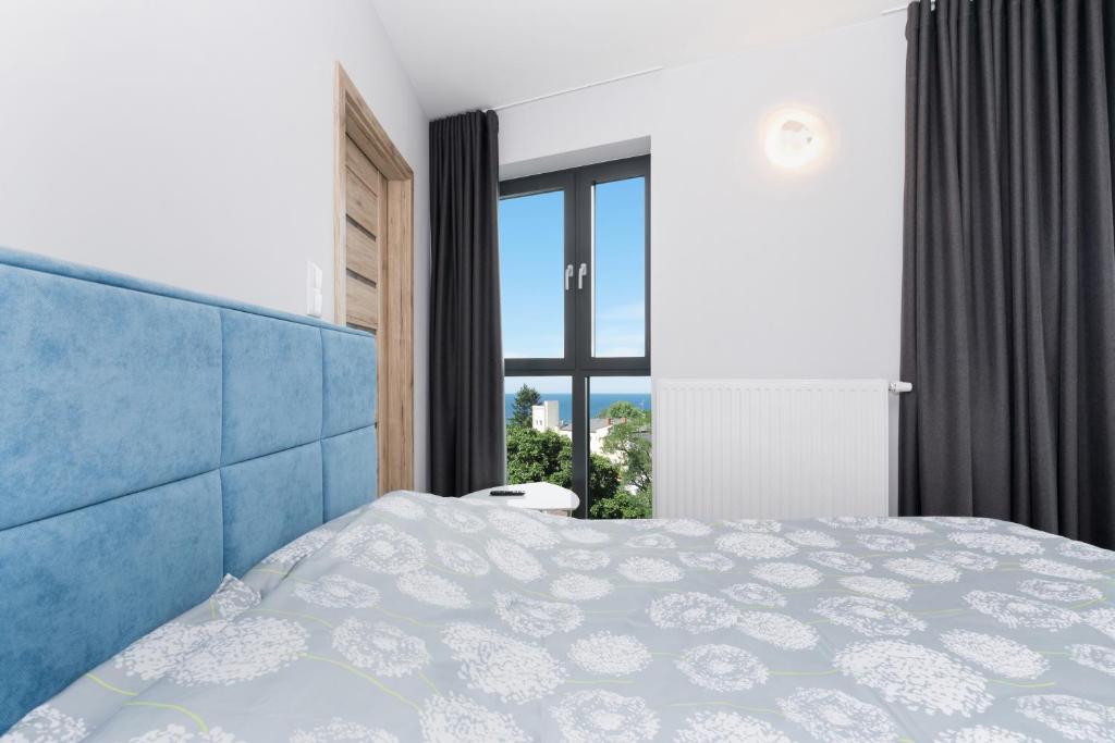 Posteľ alebo postele v izbe v ubytovaní Apartament Iwona Międzyzdroje