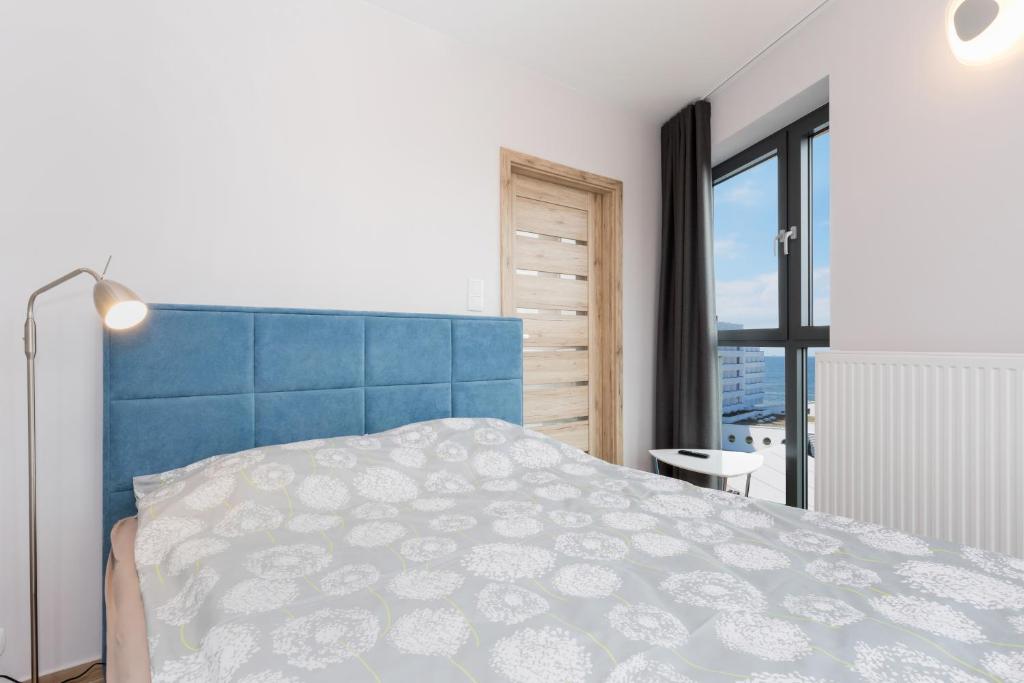 Posteľ alebo postele v izbe v ubytovaní Apartament Iwona Międzyzdroje