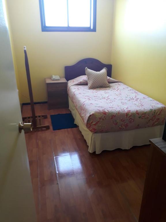 Postel nebo postele na pokoji v ubytování Hotel Aymara