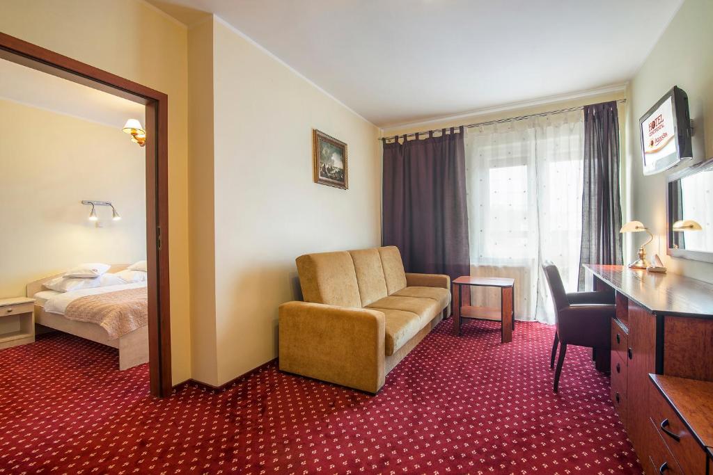 Postel nebo postele na pokoji v ubytování Hotel Continental
