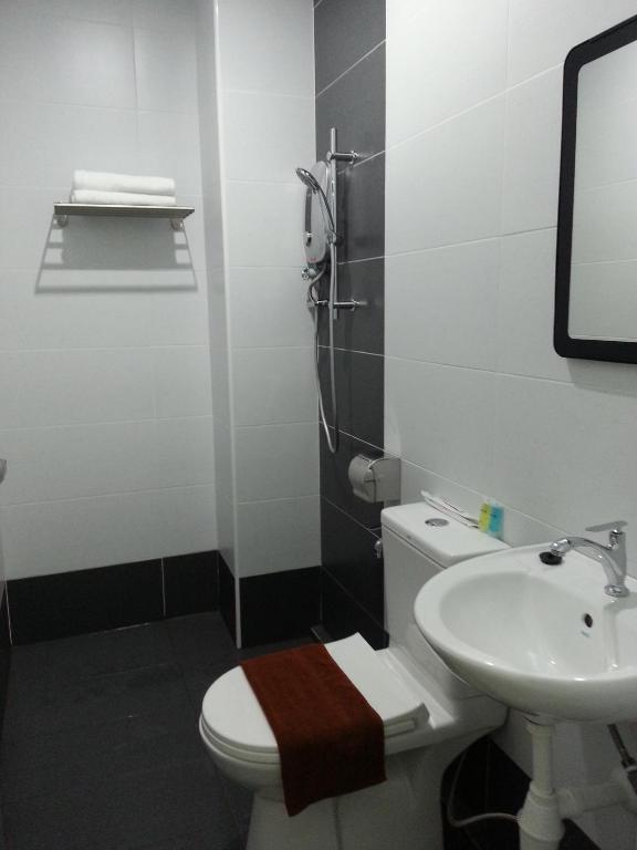 Koupelna v ubytování L Hotel