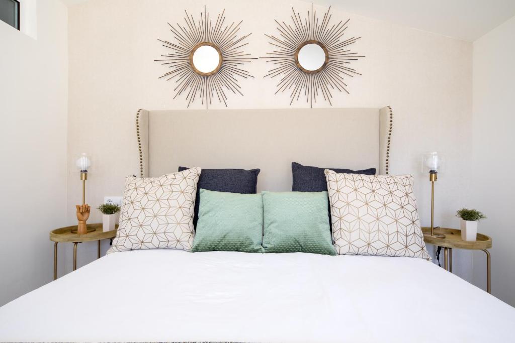 Posteľ alebo postele v izbe v ubytovaní Apartamentos Soho Boutique Museo