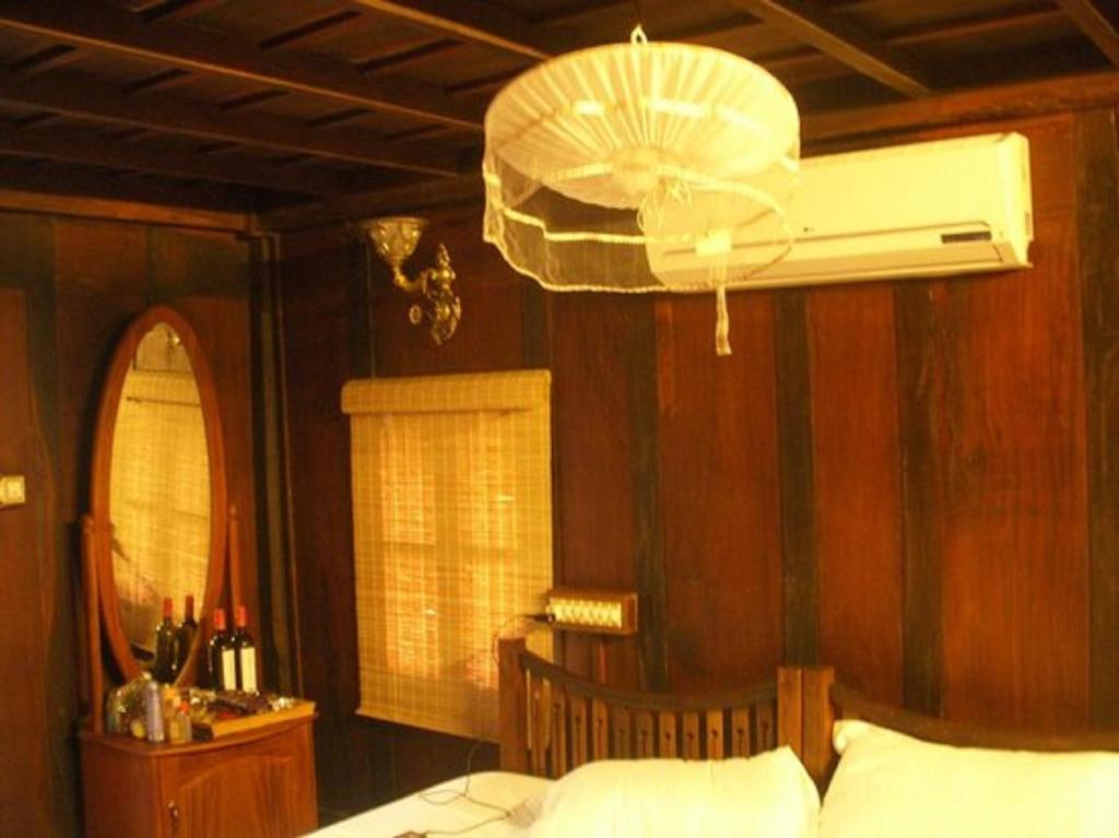 Postel nebo postele na pokoji v ubytování Palathra Heritage