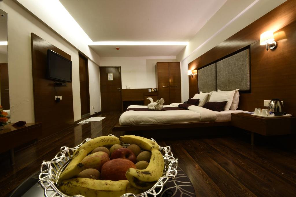 Postel nebo postele na pokoji v ubytování Hotel Platinum Residency