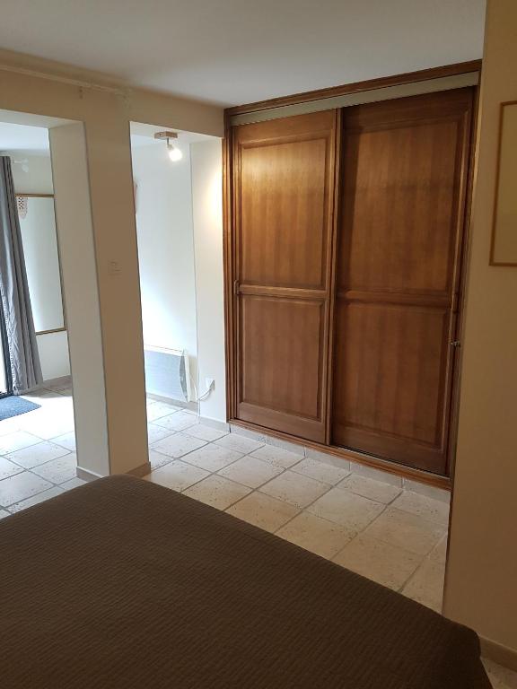 Postel nebo postele na pokoji v ubytování Villa Thebaïde Chambres d'hôtes