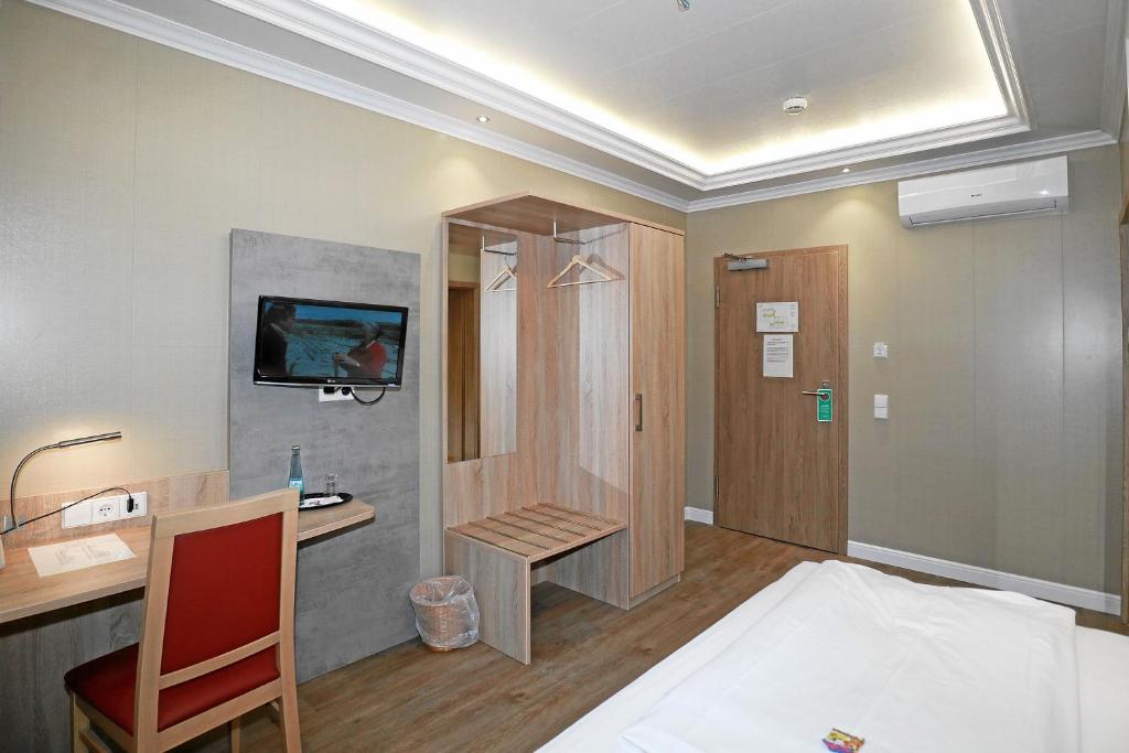 TV a/nebo společenská místnost v ubytování Hotel Danner