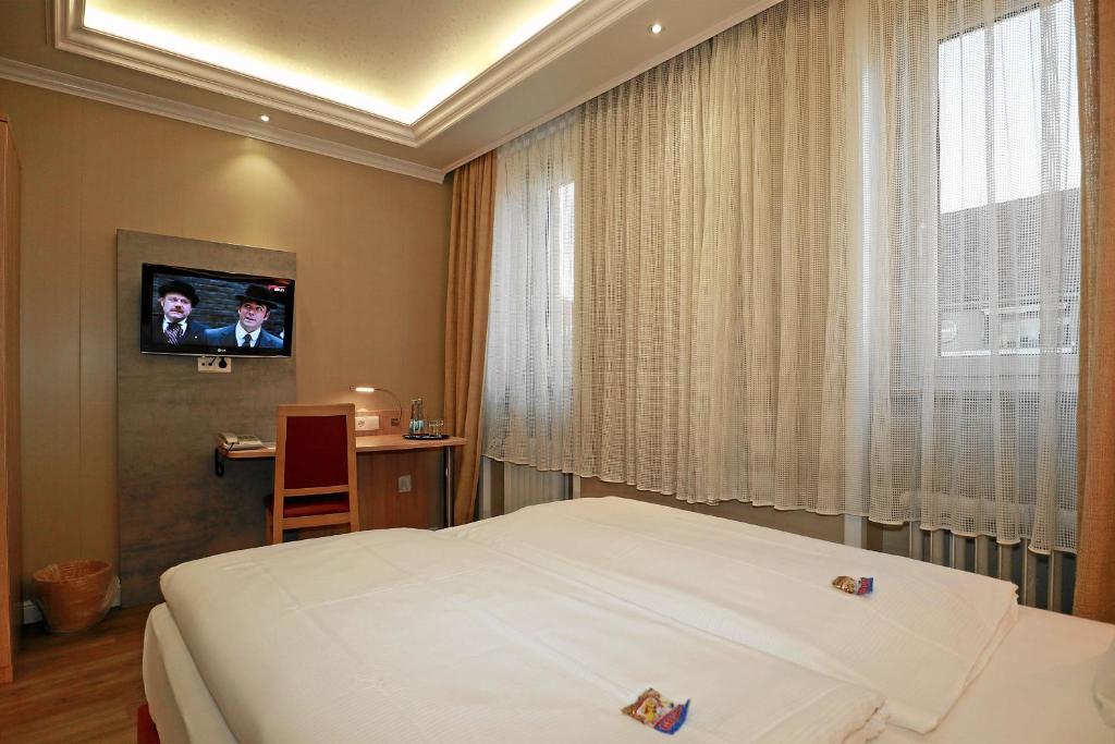 TV a/nebo společenská místnost v ubytování Hotel Danner
