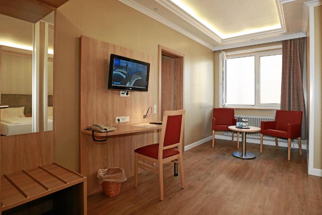 TV a/nebo společenská místnost v ubytování Hotel Danner