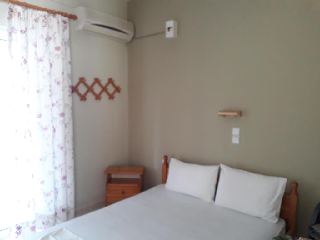 Postel nebo postele na pokoji v ubytování Oasis