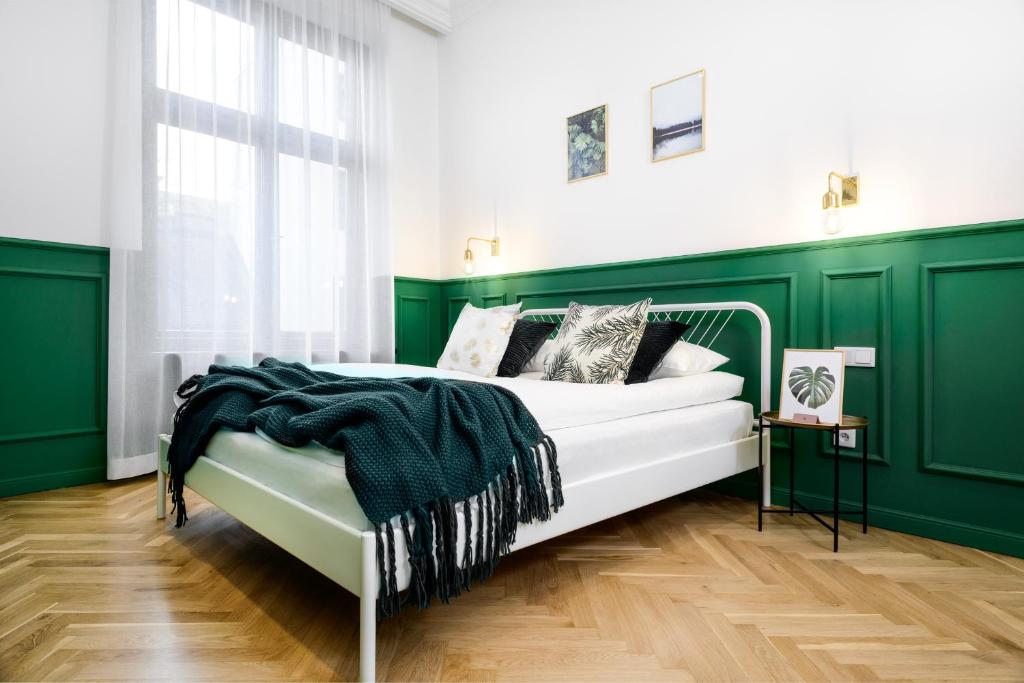 Posteľ alebo postele v izbe v ubytovaní P&J Luxury Apartments