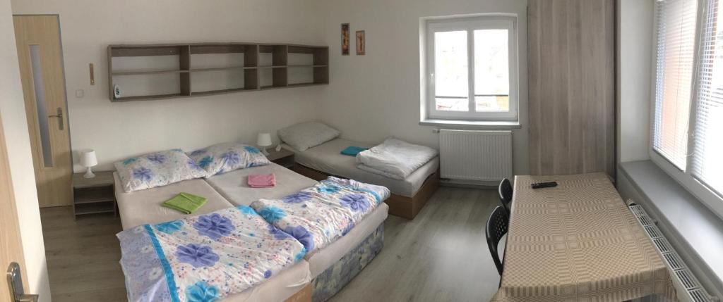 Postel nebo postele na pokoji v ubytování Ubytování ALJA