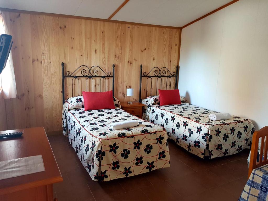 Cama o camas de una habitación en Camping Ruta del Purche