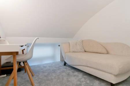 Un lugar para sentarse en Homestay Sisi