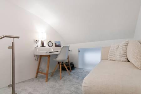 Un lugar para sentarse en Homestay Sisi