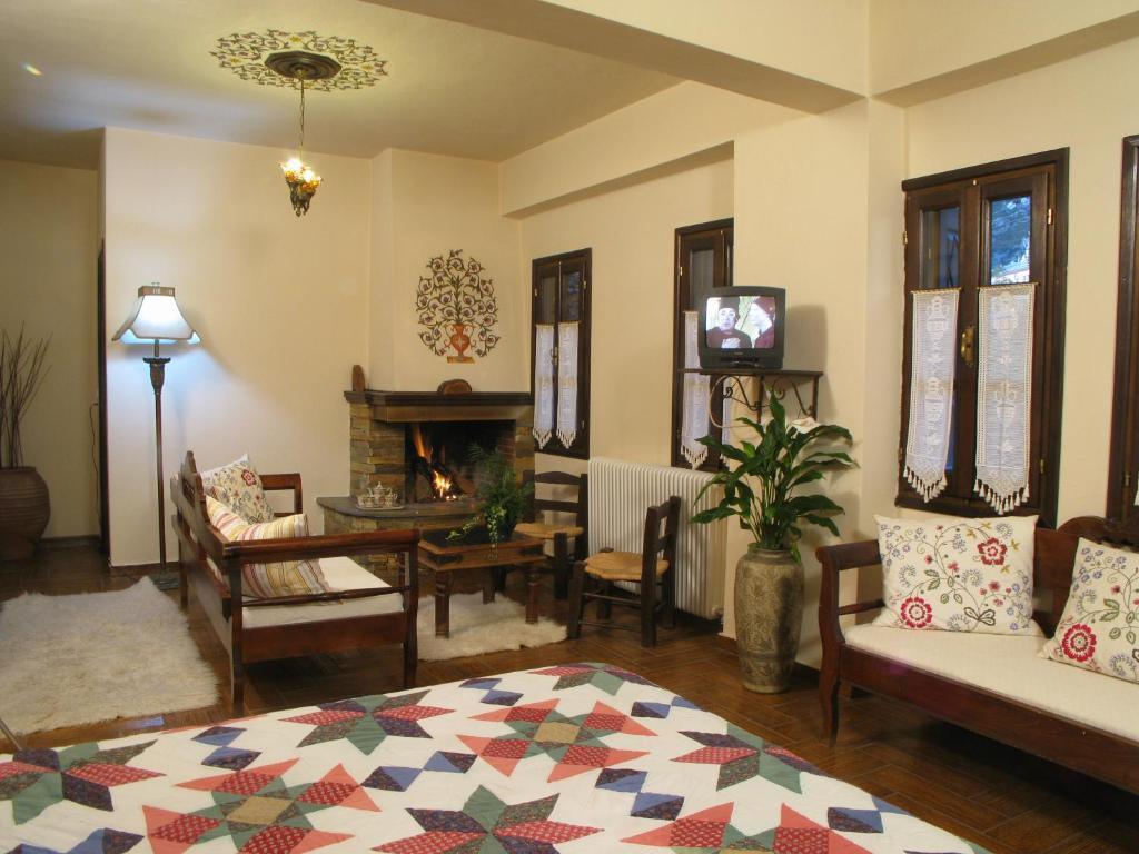 Postel nebo postele na pokoji v ubytování Guesthouse Filokalia