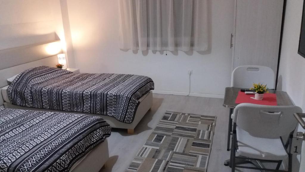 Postel nebo postele na pokoji v ubytování Guest House Vanja