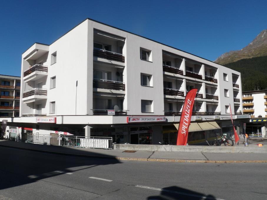 a large white building on the side of a street at Zentrum Lai (458 Kr) in Lenzerheide