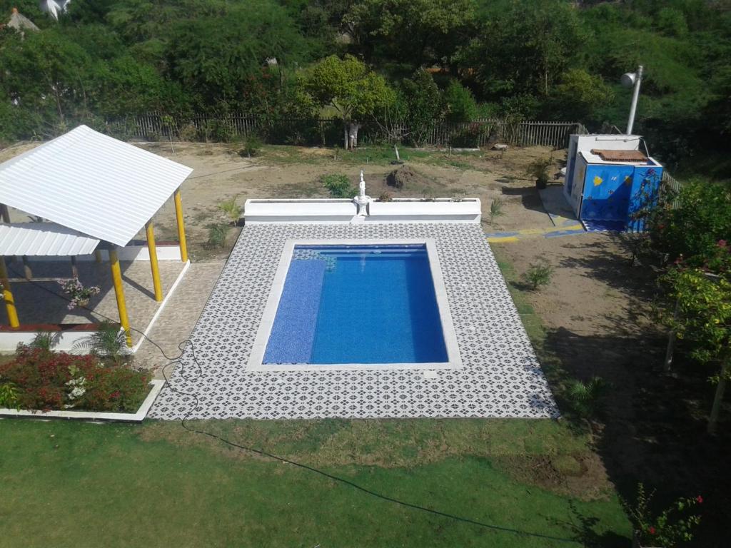 Bazén v ubytování Casa de Campo Palmarito nebo v jeho okolí