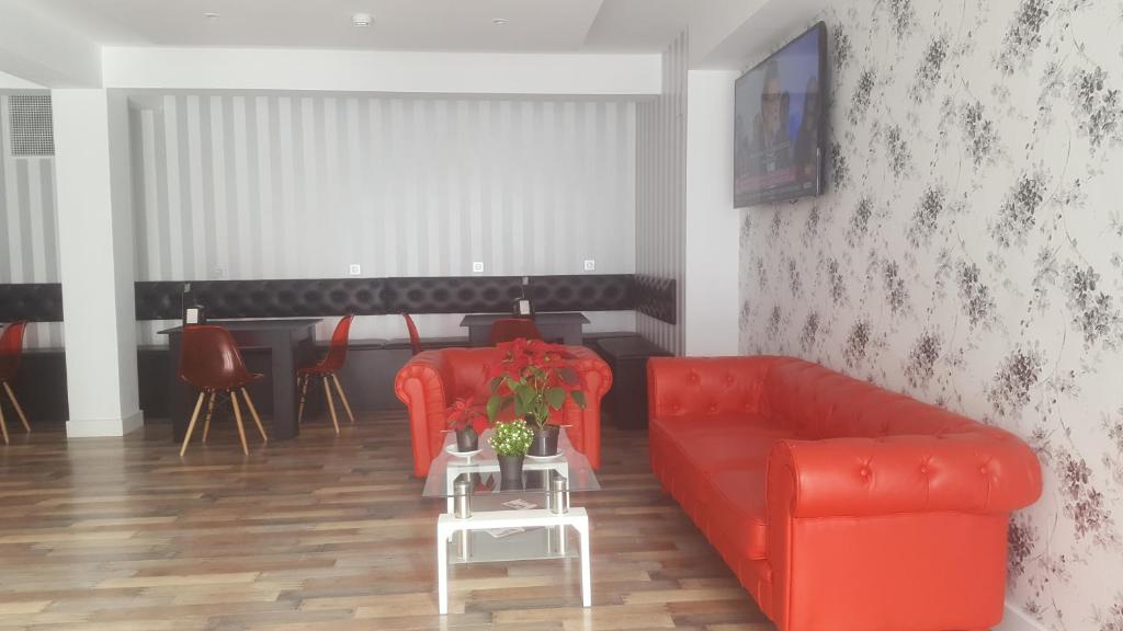 Posezení v ubytování Deluxe Hostels & Suites Merida