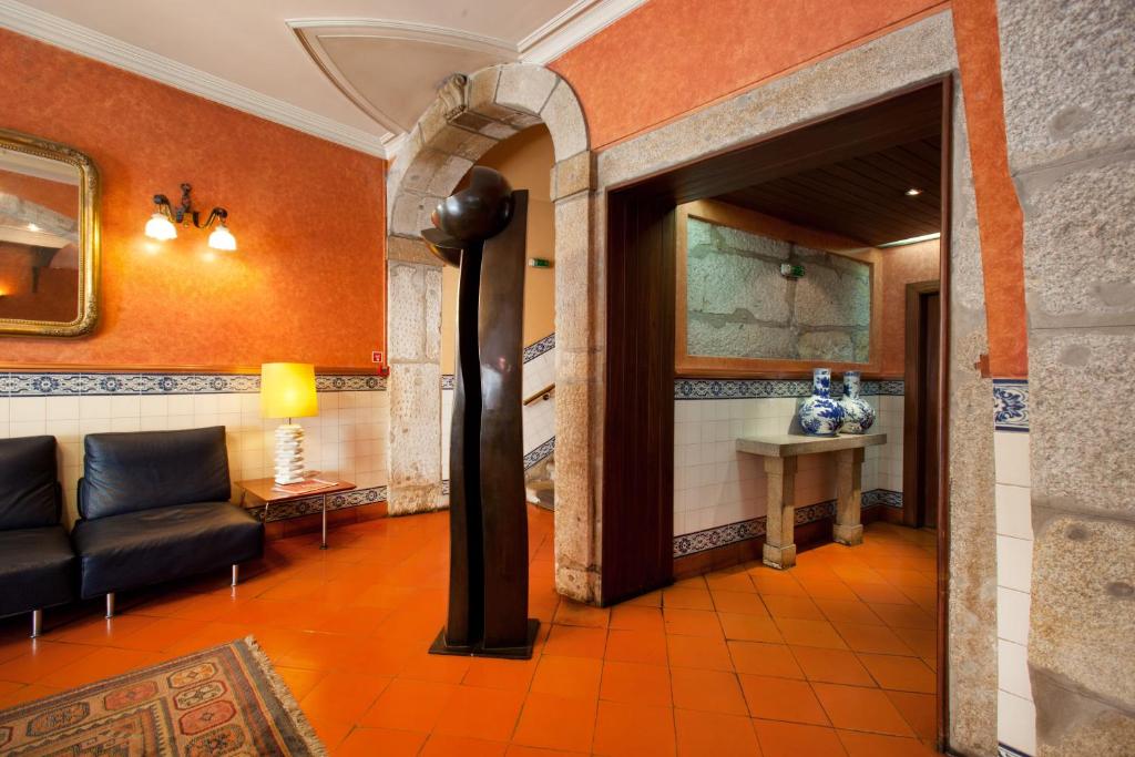 Uma área de estar em Hotel Internacional Porto