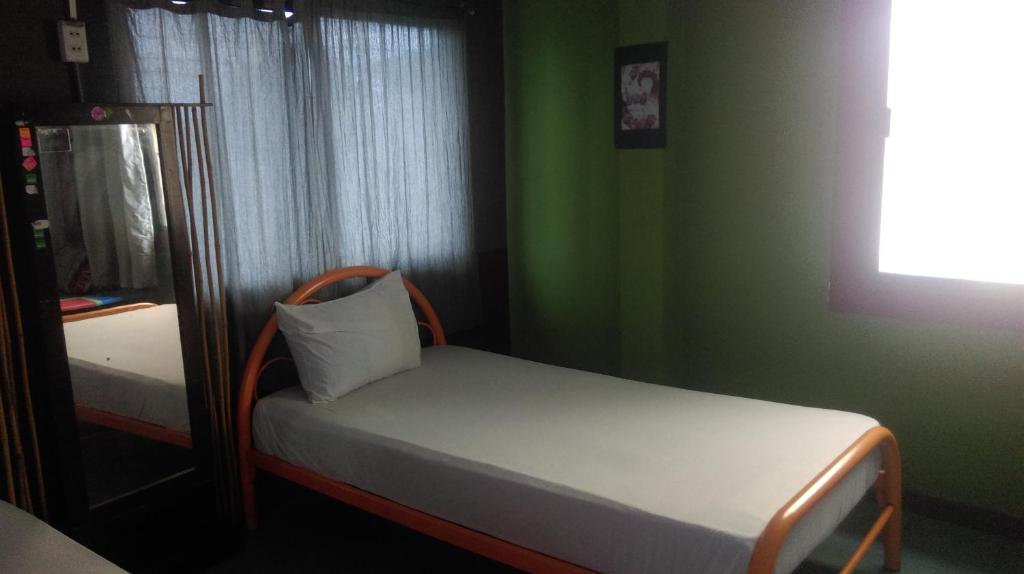 Postel nebo postele na pokoji v ubytování Mr. Clean Guesthouse