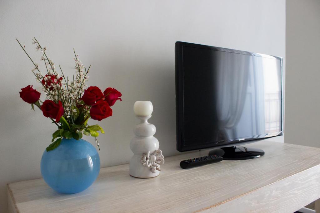 TV a/nebo společenská místnost v ubytování La Puglia di Claudia