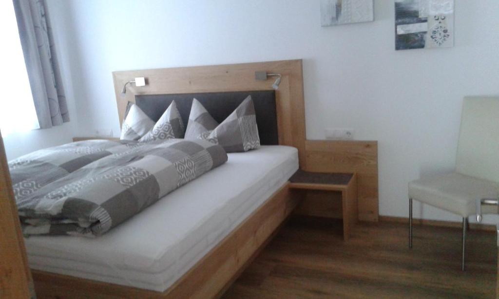 Postel nebo postele na pokoji v ubytování die Gartenwohnung - Tanja Tipotsch