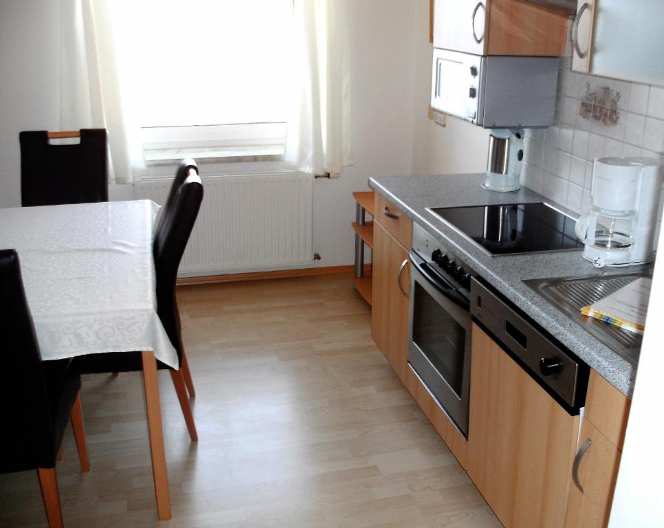 Kuchyň nebo kuchyňský kout v ubytování Pension Waldhof