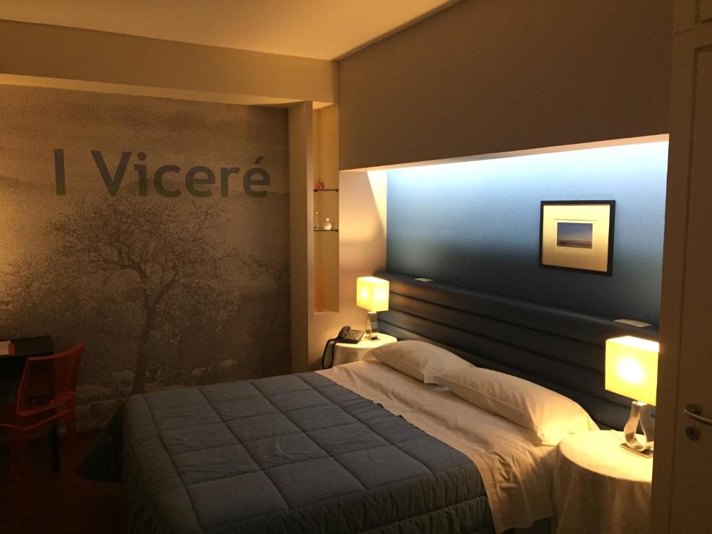 Postel nebo postele na pokoji v ubytování Mare Nostrum Petit Hôtel