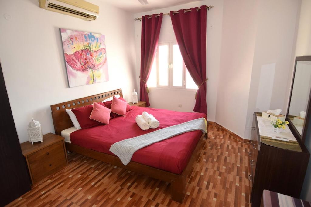 Postel nebo postele na pokoji v ubytování Lana Villa