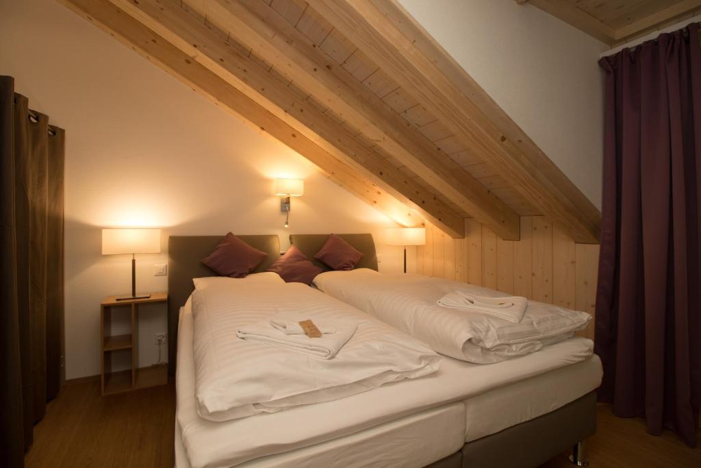 Postel nebo postele na pokoji v ubytování Chalet Belmont Penthouse